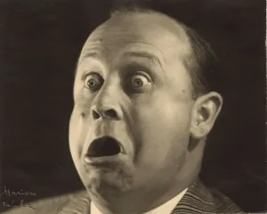 Snapshot of a mime pulling a face