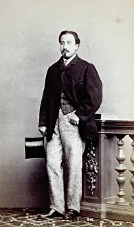 Young man in profile with top hat