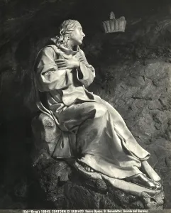 Young St. Benedict. Marble statue by Antonio Raggi located in a grotto known as Sacro Speco (Sacred Cave) inside the Monastery of St. Benedict in the environs of Subiaco
