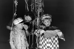 Fasching Print: Mother Dressing Two Boys, Germany 1930s