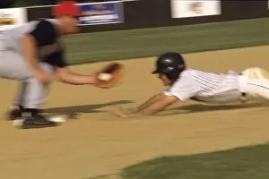 Young Baseball Player Prints: Baseball player sliding into a base