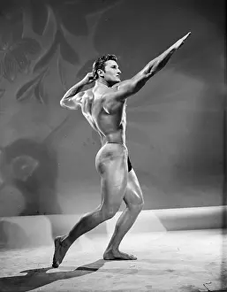 Retro Fitness Models Prints: Bodybuilder In Archer Pose c.1956