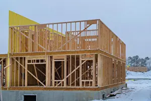 Timber Frame Construction Prints: Building frame structure on a new development timber frame for a progressing house