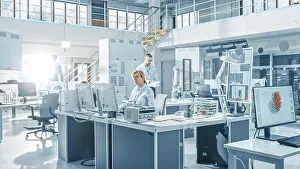 Computer Specialist Prints: Engineer working on a computer