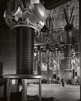 1997 Prints: Two Engineers Working with Tuning Reactors Print