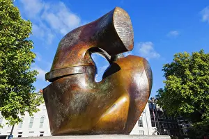 Prints of England, London, Westminster, Millbank, Riverside Walk Gardens, Sculpture titled 'Locking Peace' by Henry Moore dated 1963 Sculpture Prints: Henry Moore Print 'Locking Peace' 1963