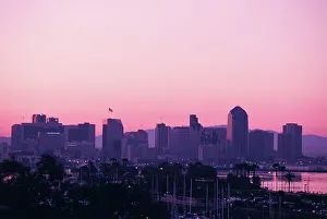 High Angle View Of A City Prints: High Angle view of a cityscape at sunset