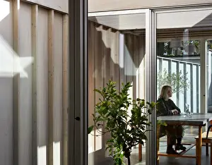 Prints of Interior view through to interior courtyard with dining space beyond. Ellis House, Ilford, United Kingdom. Architect: Buf Architects, 2019 October Prints: Interior Courtyard Print: Ellis House, Ilford