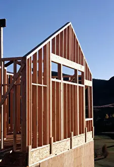 New Home Building Process Prints: Low angle view of house under construction