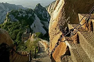 Prints of pilgrim path along stone steps, blue dragon ridge, with chain handrail, Hua Shan, Shaanxi province, Taoist mountain, China, Asia January Prints: Hua Shan Stone Steps Print