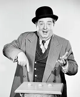 Portrait Print of a Man Pointing to Nutshells