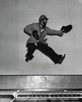 Retro Editorial Photography Prints: Robert Pullen cannot match his wife's acrobatics