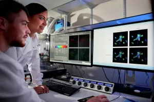 Computer Science Research Prints: Scientists in laboratory using computer