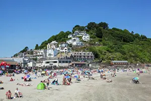 Prints of Tourists on the beach, Looe Beach, Looe, Cornwall, England Looe Prints: Looe Beach Print: Tourists on the Cornish Coast