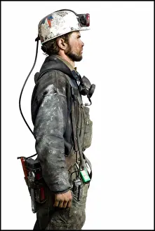 Prints of Mine worker with flashlight helmet June Prints: Mine worker with flashlight helmet Print