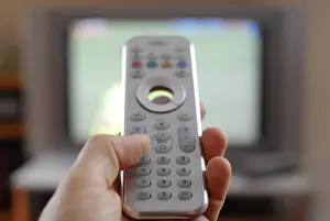 Hand Holding Remote Control Prints: 171920