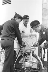 German Special Police Forces Prints: 1950s bicycle extra. The german moped and motor manufacturer Victoria supplies this bicycle help engine called Vicky