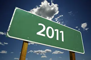 Cloudy Dramatic Atmosphere Prints: 2011 road sign with dramatic clouds and sky