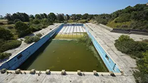 Prints of Abandoned swimming pool with algae-infested water, graffiti and concrete walls, surrounded by trees, Lost Place, Rotten swimming pool, Afandou, Rhodes, Dodecanese, Greek Islands, Greece Painting Prints: Abandoned Swimming Pool Print, Afandou, Greece