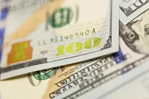 Close Up Dollar Bill Prints: Abstraact of one hundred dollar bill laying on flat surface