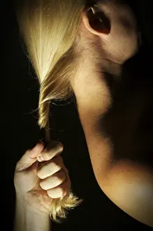 Caucasion Ethnicity Photo Prints: Abstract dramatically lit image of woman's shoulder