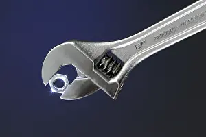 Indoor Still Life Photography Prints: Adjustable wrench with nut