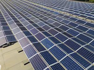 Renewable Energy Landscape Prints: An aerial view of a solar panel array in Switzerland