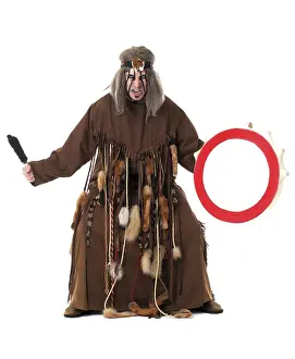 Music Instrument Photography Prints: Aggressive middle-aged shaman posing at camera