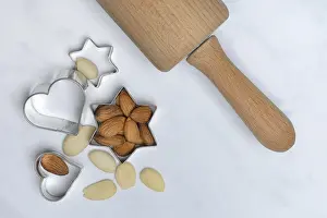 Kitchen Utensils For Baking Prints: Almonds and biscuit cutters for biscuits