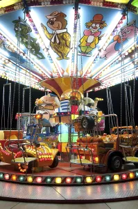 Folkloric Fairground Rides Prints: Amusement park at night