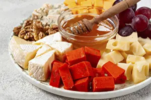 Assorted Cheese Platter Prints: Appetizer, assorted cheese, with nuts and honey
