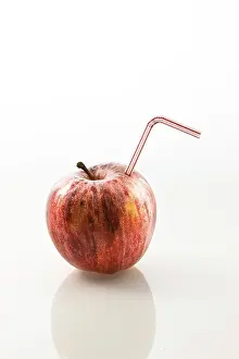 Healthy Eating Image Prints: Apple with a straw as a drink