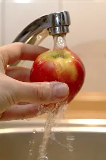 Healthy Dessert Ideas Prints: An apple being washed