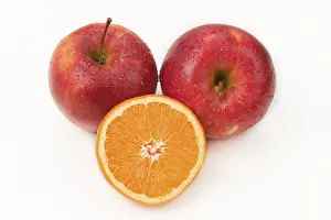 Balanced Diet Stock Photos Prints: Two apples and one orange slice