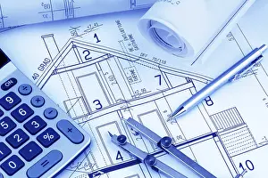 Architect Construction Plan Prints: An architect's construction plan with a calculator