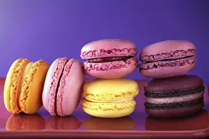 Empty Bakery Products Display Prints: Array of macaroons coming in shades of yellow and pink
