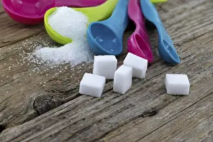 Deserted Grocery Store Prints: Array of sugar presentations on a wooden table