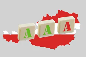Prints of Three A's on a map of Austria, one is red as a symbol of the risk of losing the Triple A ranking, symbolic image for the rating by the rating agencies Three A's on a map of Austria Map Prints: Three A's on a Map of Austria Print - Triple A Ranking Risk
