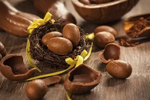 Traditional Easter Treats Prints: Assorted chocolate eggs for Easter on wooden background