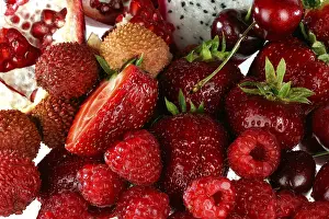 Indoor Plant Photography Prints: Assorted red fruit on white background