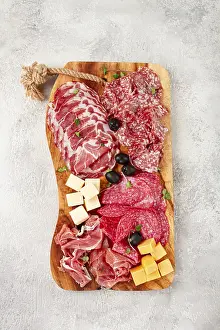 Prosciutto Salami Ham Prints: Assorted, sliced meat appetizer