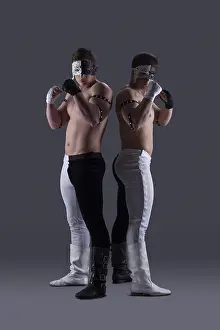 Black And White Studio Photography Prints: Two attractive men in masks posing in studio