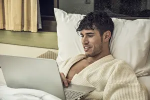 Young Man Working Prints: Attractive Young Man with Serious Expression