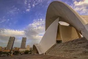 Prints of Auditorio de Tenerife, Anvangardist opera house by Spanish architect Calatrava, side view of a modern building with stairs and skyscrapers in the background, capital, Santa Cruz de Tenerife Opera Prints: Auditorio de Tenerife Print, Santa Cruz de Tenerife, Spain