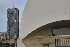 Prints of Auditorio de Tenerife, Anvangardist opera house by Spanish architect Calatrava, detailed view of a modern building next to a high-rise building in an urban landscape, capital, Santa Cruz de Tenerife Opera Prints: Auditorio de Tenerife Print, Santa Cruz de Tenerife, Spain