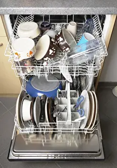 Empty Kitchen Scene Prints: automatic dishwasher machine filled with clean dishes