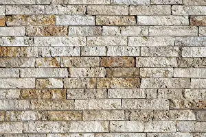 Uninhabited Stone Structure Prints: Background consisting of a wall of beige and brown clinker bricks