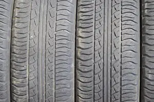 Close Up Tire Prints: The background of the tread pattern of the car wheel