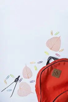 Blue Background Image Prints: Backpack and school subjects on a blue background