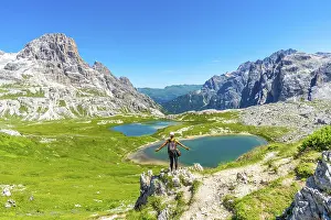 Italian Dolomites Prints: Backpacker standing with open arms